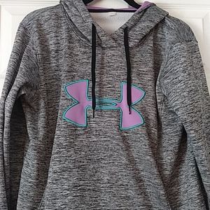 An Under Armour hoodie with pockets